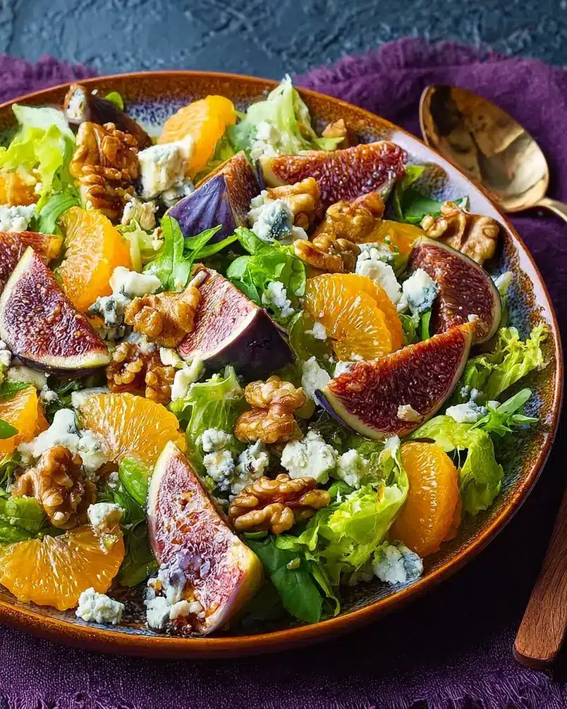 Orange, Fig, and Gorgonzola Salad 3 Assembling the Orange, Fig, and Gorgonzola Salad with dressing being drizzled